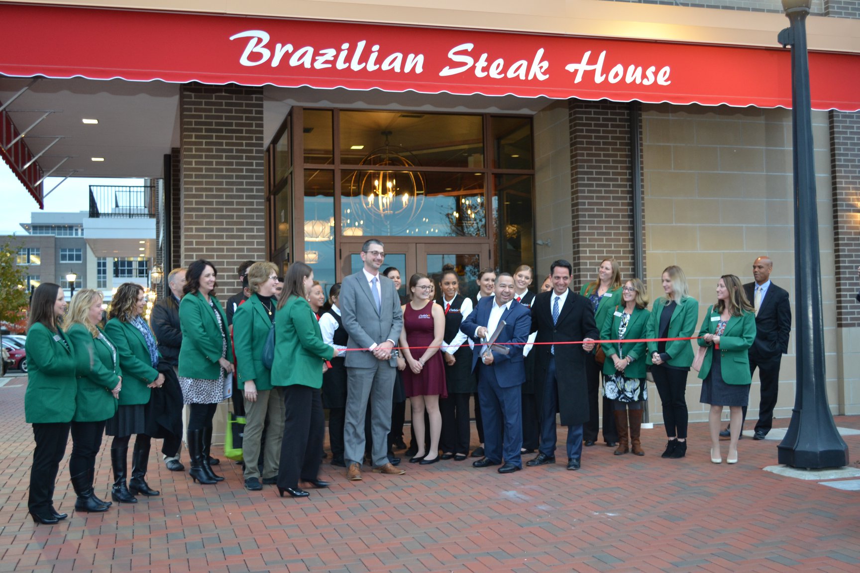 Chamber members gather for a ribbon cutting at Costela Brazilian Steakhouse