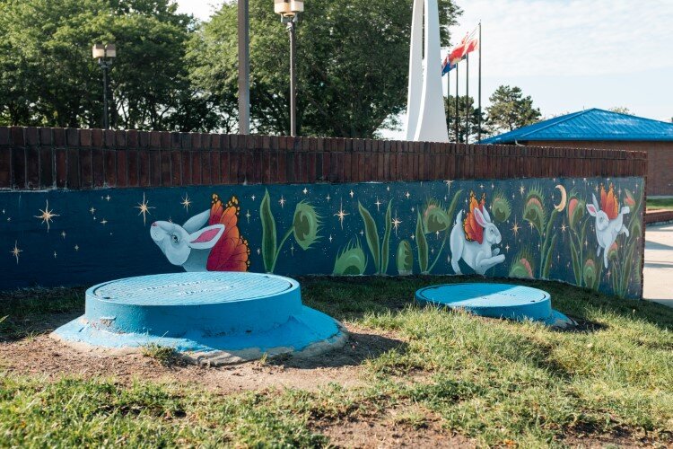 Two decorative brick walls in Wenonah Park became canvases for some of the murals.