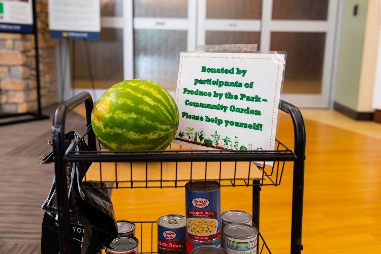 Shelving that is used for excess produce provides access to fresh fruits and vegetables for any patient or community member who may be passing by.