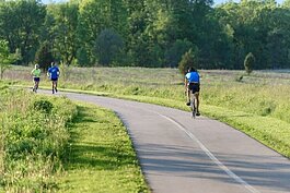 Bikers and runners take a trip on the B2B Trail.