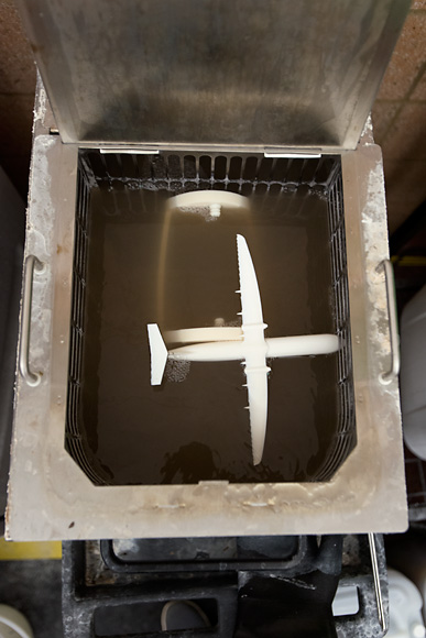 Removing the support material from an airplane printed on the FDM Machine
