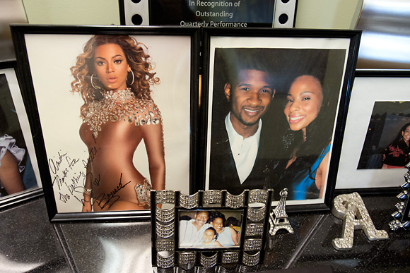 A signed Beyonce photo and a photo of Anistia and Usher in her office