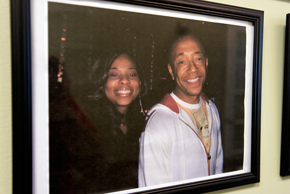 A photo of Anistia and Russell Simmons in her office