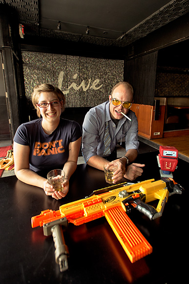 Amber Conville and Hunter S Thompson doing Bulleit shots before the nerf bullet shots fly