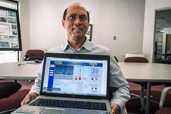 Dilip Nigam remotely monitoring ArborWind's vertical-axis wind turbine in Marshall