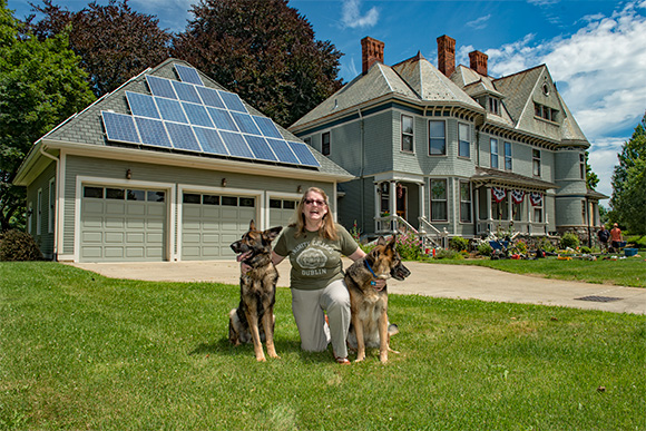 Maggie Brandt's historic Ypsilanti home with solar panels on the garage