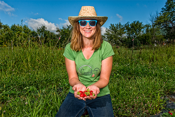 Dynelle Mackey picking strawberries at Tilian Farm