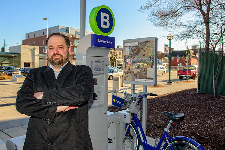 Clean Energy Coalition executive director Sean Reed at an ArborBike station