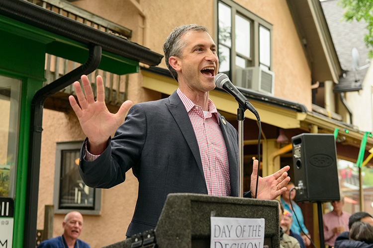 Chris Taylor speaking outside the Jim Toy Communty Center for the Supreme Court same sex marriage ruling celebration in 2015