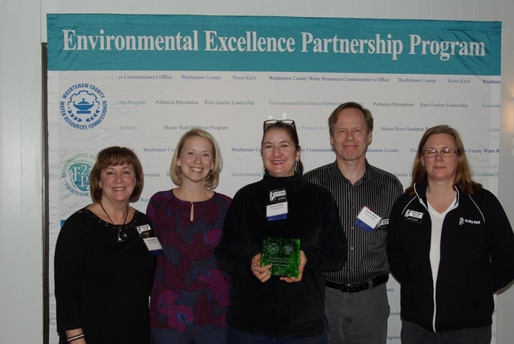 The Betty Brigade collects its award for waste reduction and recycling.