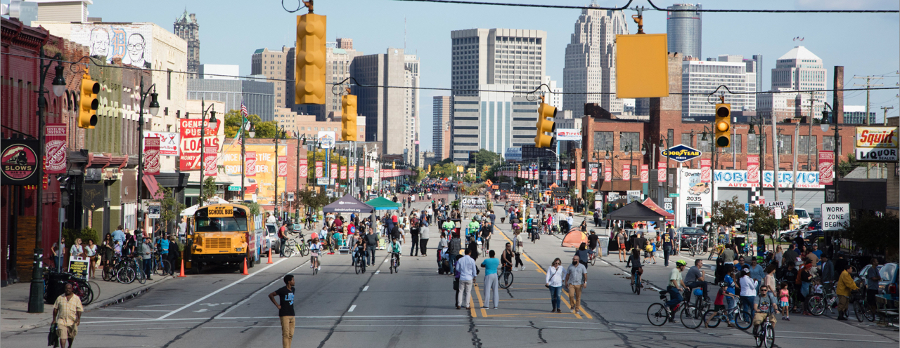 People roam Michigan Avenue during the Open Streets Detroit event.