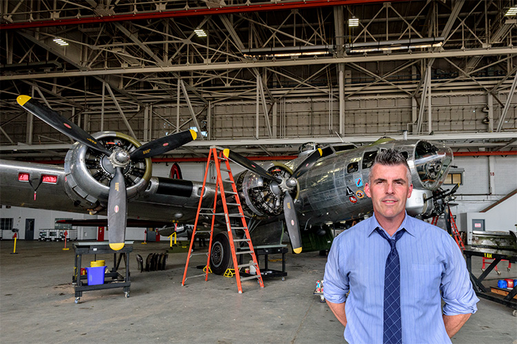 Kevin Walsh with the B-17 at the Yankee Air Museum