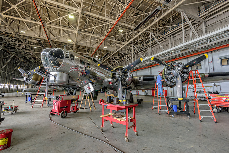 Engine maintenance being performed on the B-17 at the Yankee Air Museum