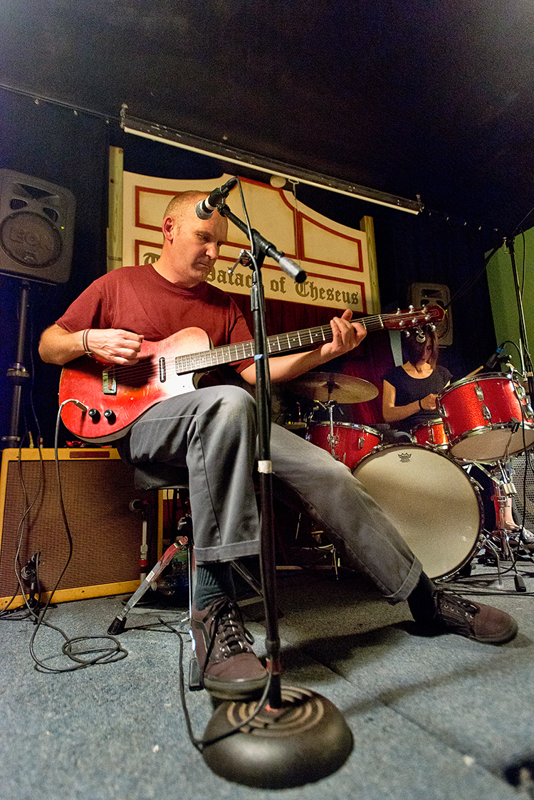 Ian MacKaye playing at the Dreamland Theater