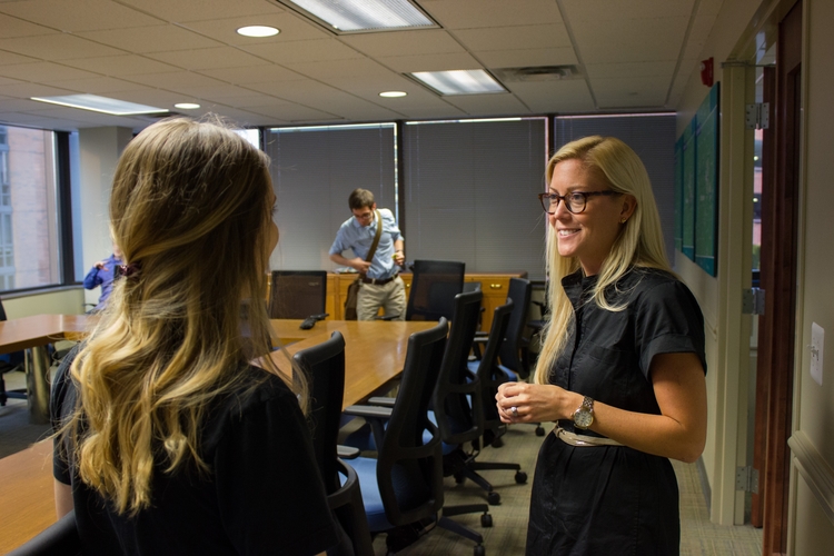 Intern Nicole Raymond speaks to guest speaker Jasmine Burns, senior recruiter at Duo Security.