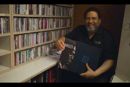 Michael Jewett shows off a copy of Kind of Blue at WEMU.