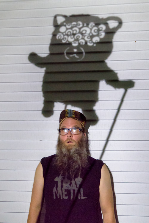 Patrick Elkins with one of his shadow puppets