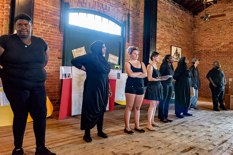 A performance of Voices From Ozone at the Ypsilanti Freighthouse
