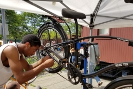 Volunteers and cyclists work together at the Ypsi Bike Co-Op.