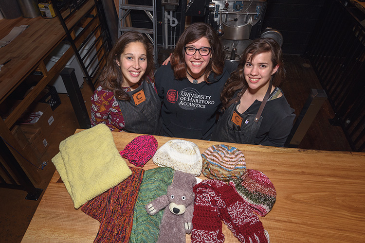 Cultivate knitting group members Bekah Wallace, Hannah Williamson and Katie Morris