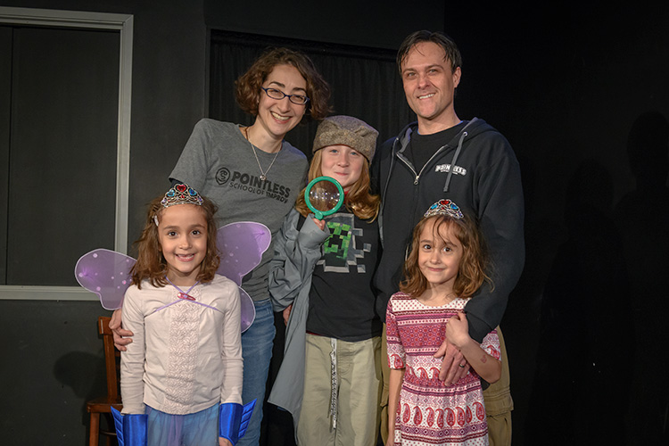 Tori and Jason Tomalia with their kids at Pointless Brewery & Theatre