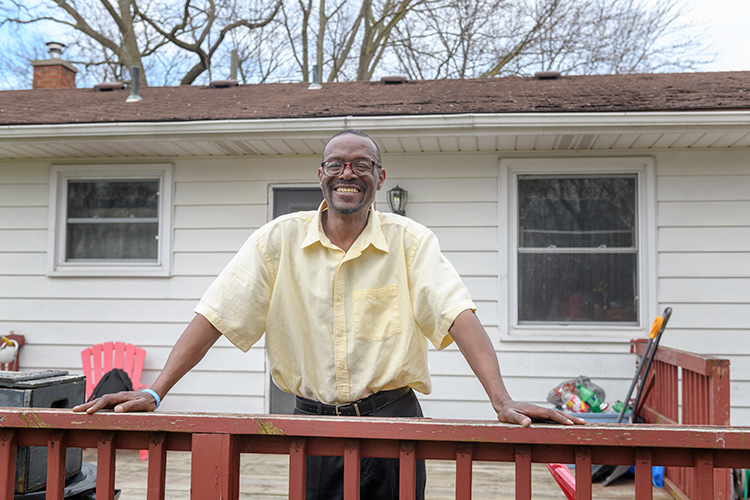 Michael Simmons outside his home on Bell Street