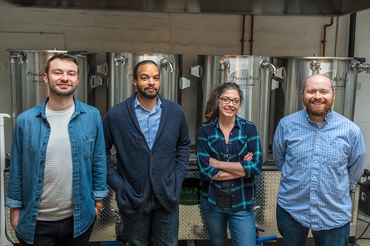 Alex Merz, Brtian Jones-Chance, Mariah Gavin and Patrick Echlin inside of 734 Brewing Company