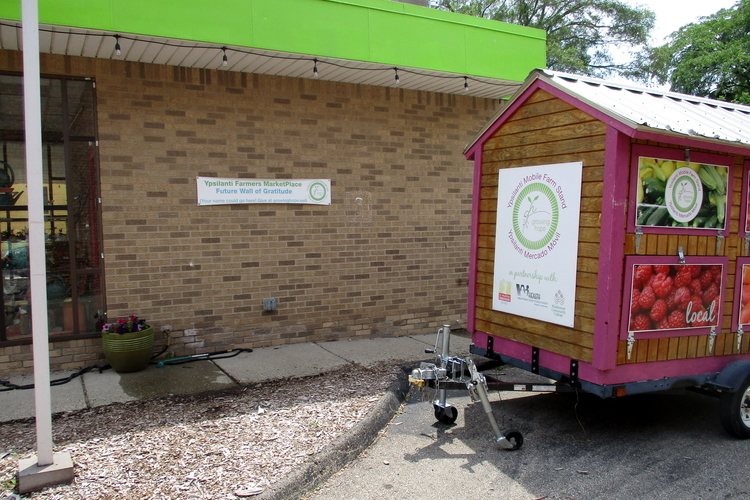 Growing Hope will continue to use its mobile food stand and will turn the former KeyBank drive-thru building at 16 S. Washington St. into a Welcome Center for the Tuesday farmers market.