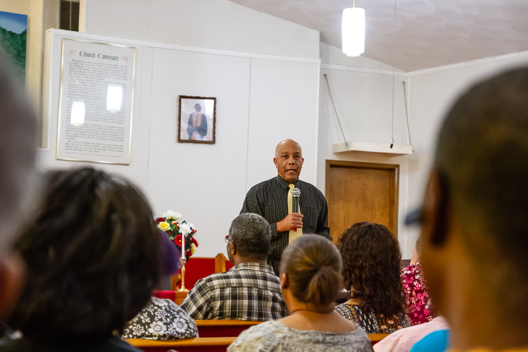 Nat Alston addresses the crowd at the Walking While Black: L.O.V.E. is the Answer screening on July 26 at New Testament Baptist Church in Ypsi.