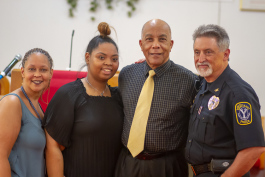 Leah Mills, Erin Mills, Nat Alston, and Tony DeGiusti pose for a photo after the Walking While Black: L.O.V.E. is the Answer screening on July 26 at New Testament Baptist Church in Ypsi.