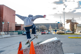 A skateboarder at the downtown Ann Arbor Library Lot