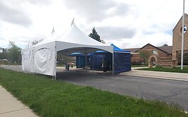 Packard Health's COVID-19 testing tent at Perry Early Learning Center on May 8.