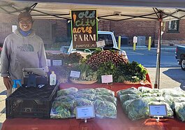 Alex Ball vends his produce.