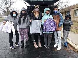 Elevation Youth participants collect winter clothing for the organization's 2020 coat drive.