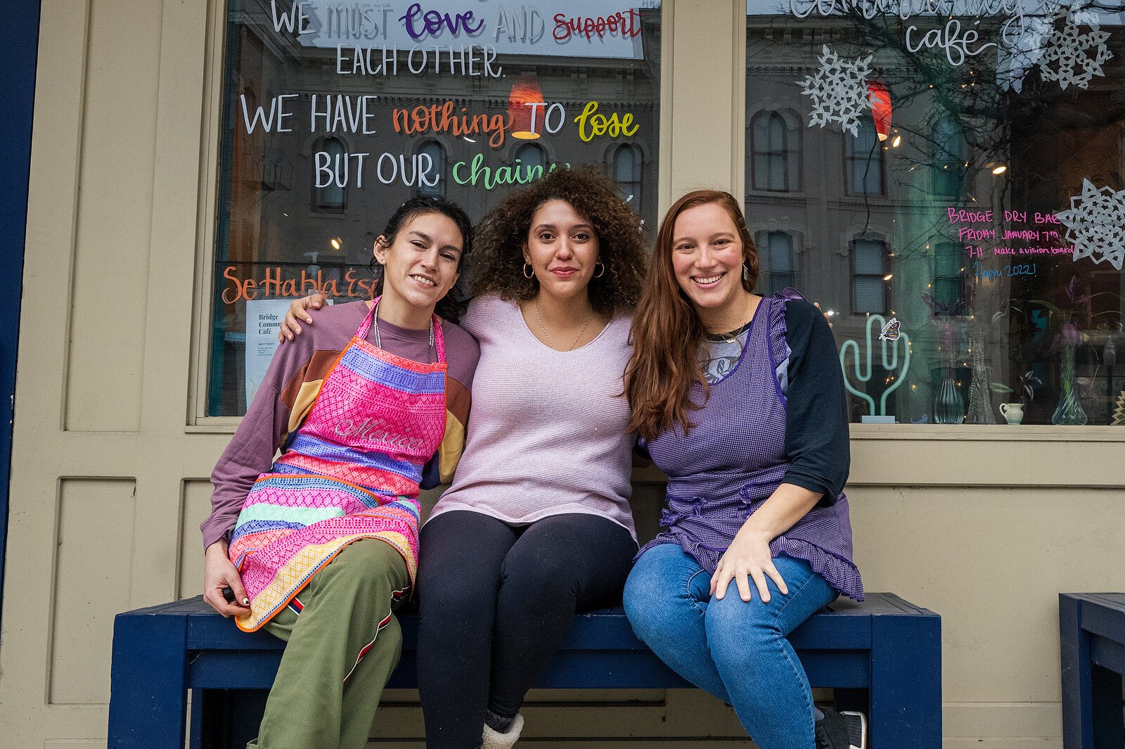Sierra Lambert, Gabrielle Watts, and Maria Pomo Castillo at Bridge Community Cafe.