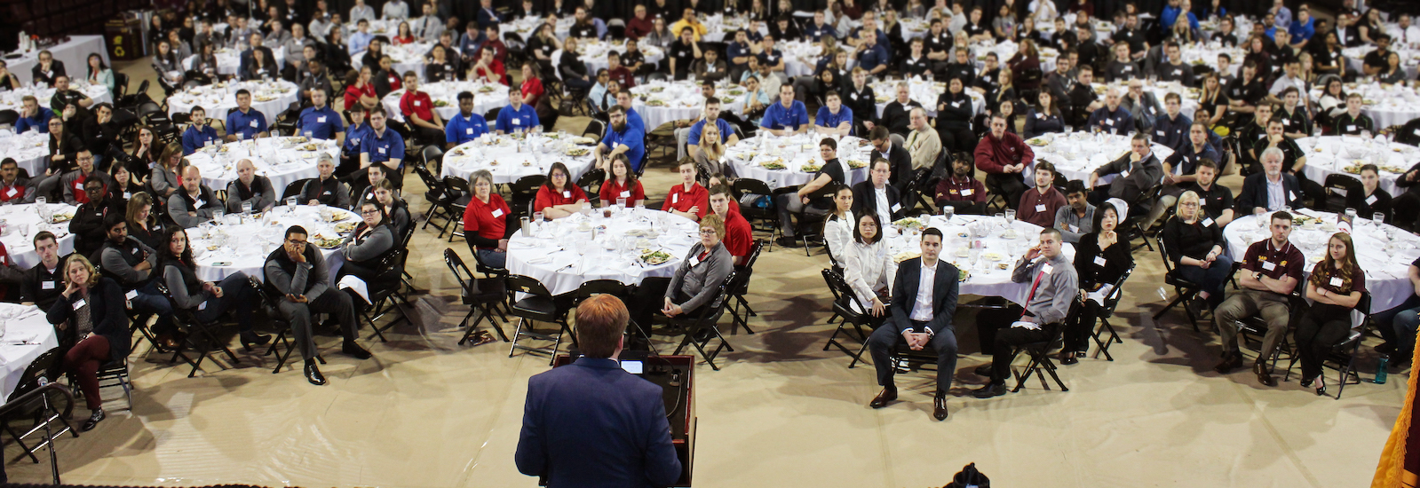 Scott King, Manager of Global Manufacturing and Industrial Internet of Things at Ford Motor Company, addresses over 200 students at the 7th Annual ERPsim Invitational Competition, before the competition begins on Feb. 14, 2019.