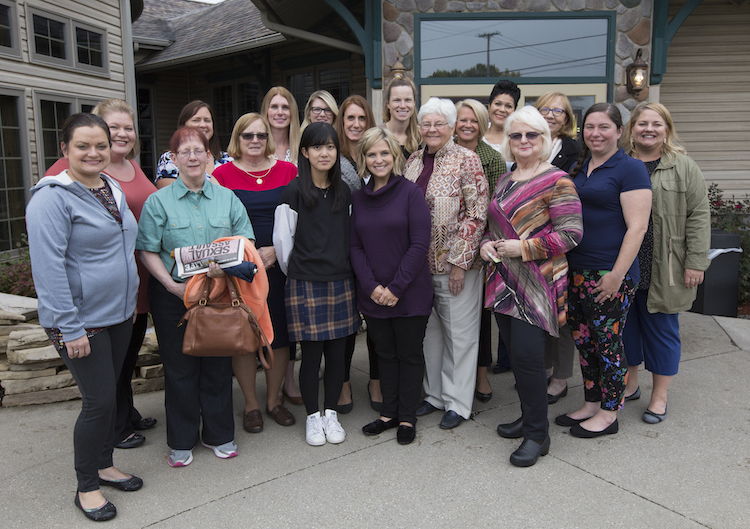 The women of the Mt. Pleasant Rotary Club pose for a photo outside Mountain Town Station following their meeting on Monday, Oct. 8, 2018.