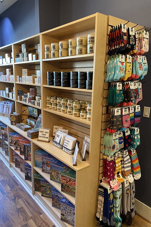 Sleepy Dog Books offers a wide selection of items sourced from Michigan and women-owned businesses.