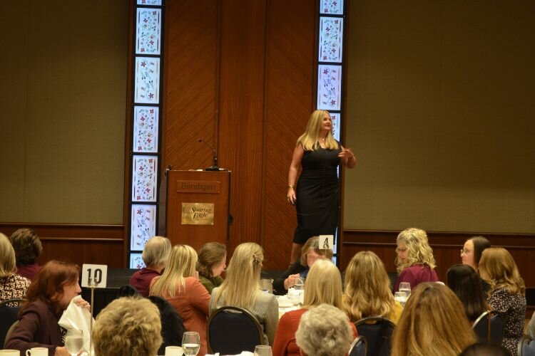 Wendy Groll presenting her keynote speech during the Look Who's Talking luncheon Wednesday, Oct. 11, 2023.