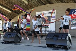 Dancers of I AM Academy perform during the Juneteenth Freedom Festival at Kollen Park in Holland, Michigan, June 18, 2022.