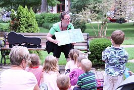 Children gather for storytime presented by Herrick District Library. 