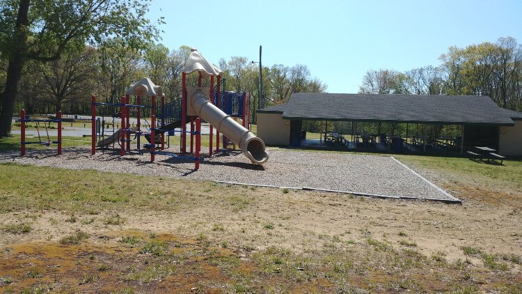 Littlejohn County Park includes a developed area with dozens of picnic tables and grills along with a playground, a nature trail, and a large wooden pavilion with electricity.