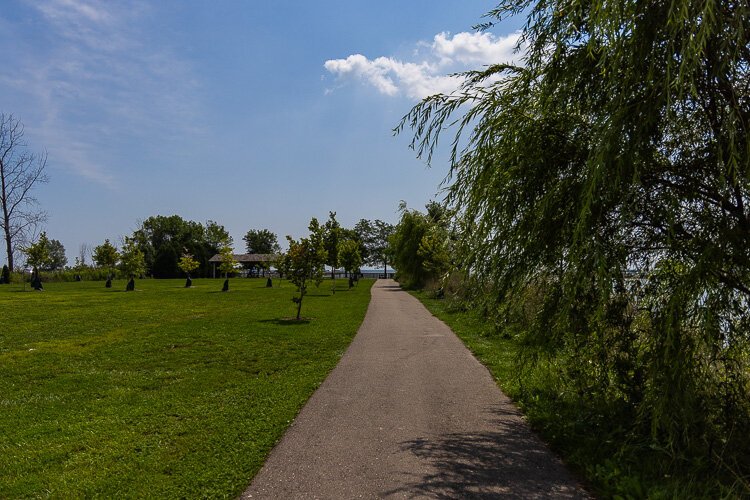 A bike path running alongside the Clinton River Spillway.