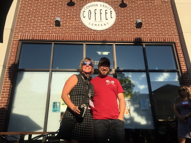 Cristina Decius-Sheppard, director of Downtown Dearborn,, and Dale Tremblay Dulong, owner of Common Grace Coffee, pose for a photo during the International Council of Shopping Centers East Michigan P3 Program tour on Oct. 5.