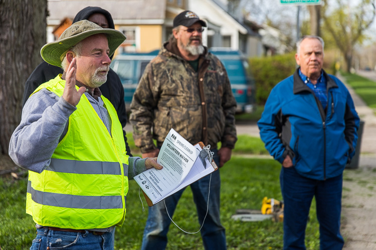 Tim Travis, owner of the Goldner Walsh nursery, give volunteers an Earth Day cleanup pep talk.  Photo by David Lewinski.