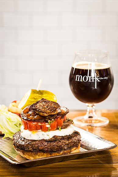 Monk's Burger with Foie Gras, Herbed Goat Cheese, Pancetta, and Marinated Tomato with Bastone Beer