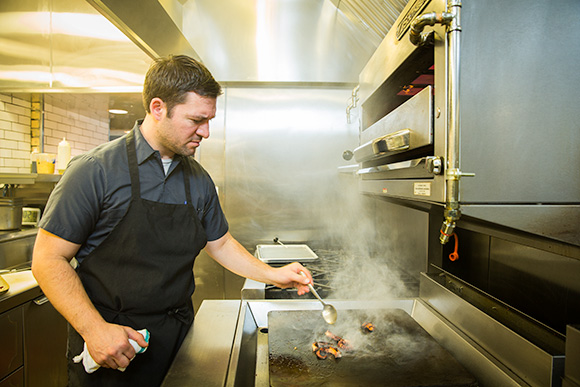 Chef Andy Hollyday of the Selden Standard Cooking Octopus-Detroit
