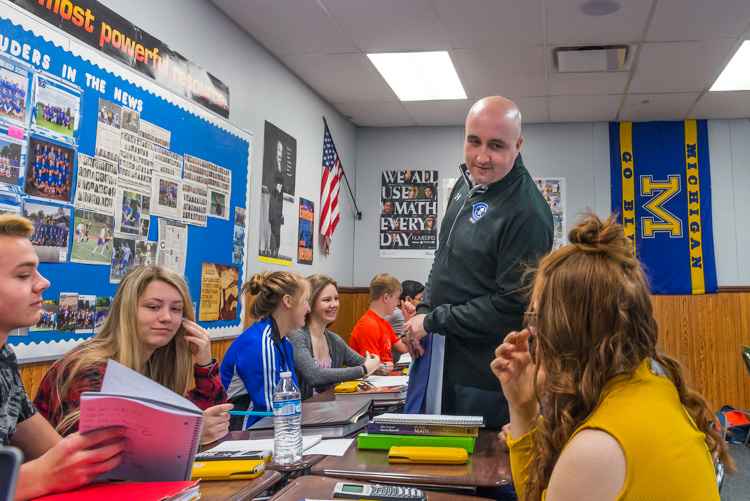 Math teacher Rocco Giorgi with students