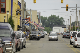Saginaw Street in downtown Bay City lined with American flags
