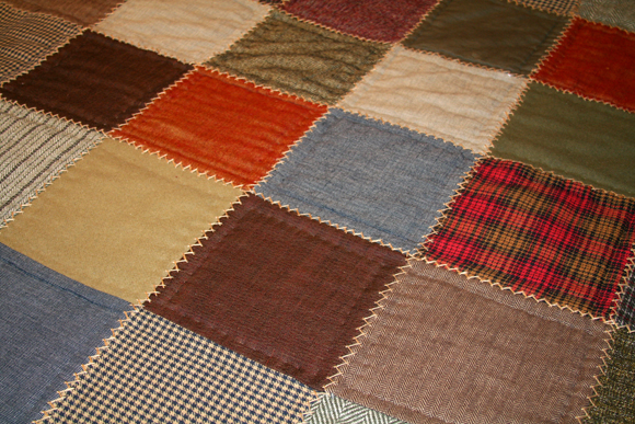 Warm and cozy quilts are sometimes made by hand. 